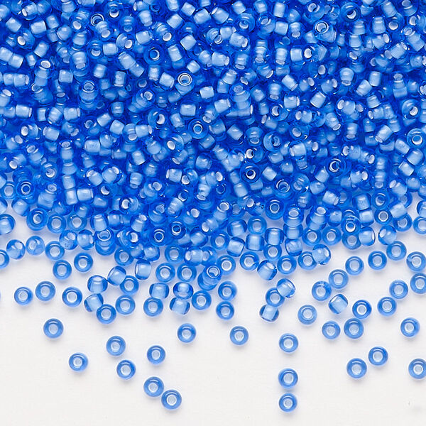 Seed bead, Preciosa Ornela, glass, transparent chalkwhite-lined light sapphire, #11 rocaille. Sold per 500-gram pkg. image number 0