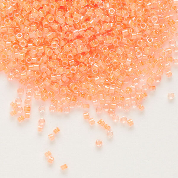 Seed bead, Delica®, glass, pkg/50g, #11 round, translucent luminous inside dyed color creamsicle (DB-2033). image number 0