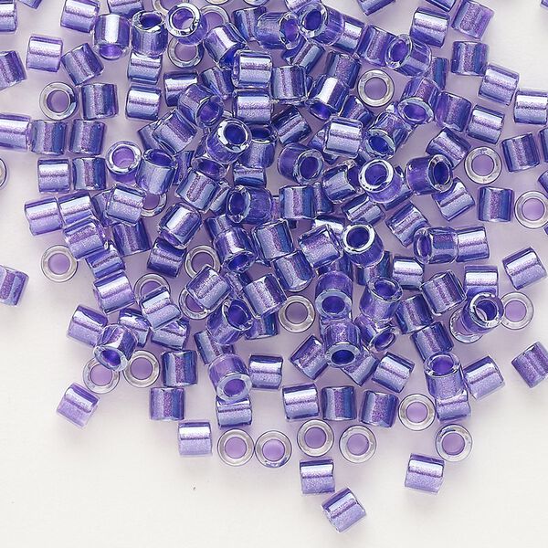Seed bead, Delica®, glass, pkg/7.5g, #8 round, translucent purple-lined luster crystal clear (DBL-0906). image number 0