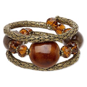 Bracelet, glass / porcelain / steel memory wire / antique brass-plated steel, honey and brown, 39mm wide with flat round, adjustable from 7-9 inches. Sold individually.