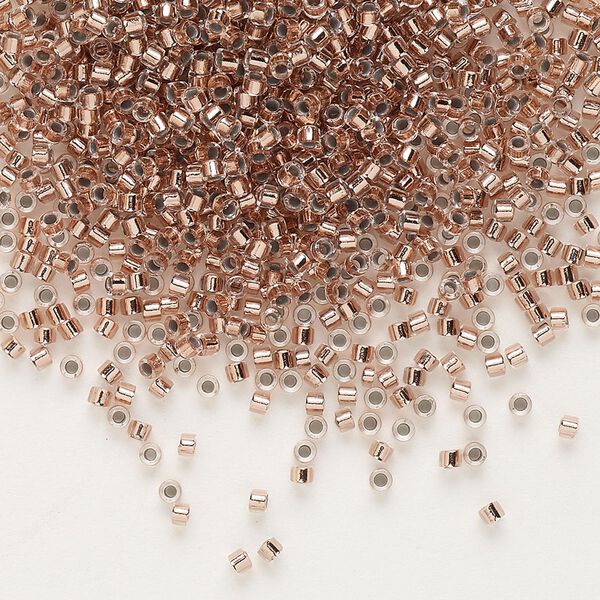 Seed bead, Delica®, glass, pkg/7.5g, #11 round, transparent copper-lined crystal clear (DB-0037). image number 0