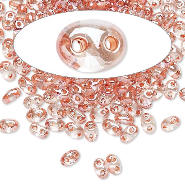 Seed bead, Preciosa Twin™ Czech glass, pkg/10g, 5x2.5mm oval, transparent peach terra color-lined clear, (38689). image number 0