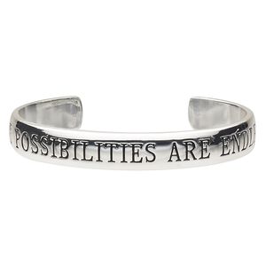 Bracelet, cuff, silver-plated brass, 11mm wide with "THE POSSIBILITIES ARE ENDLESS," 7 inches. Sold individually.