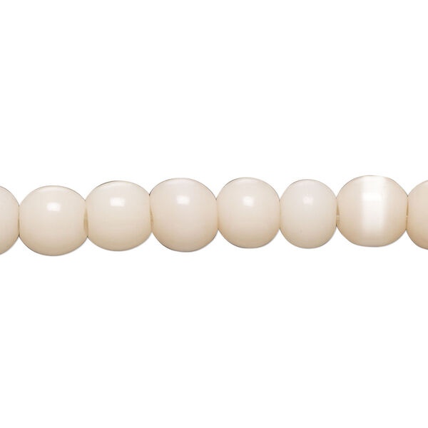 Bead, cat's eye glass (fiber optic glass), pale peach, 6-8mm round. Sold per 14-inch strand, approximately 55 beads. image number 0
