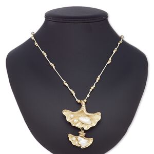Necklace, plastic / resin / waxed cotton cord / gold-coated plastic / gold-finished steel / "pewter" (zinc-based alloy), cream and white, 67x57mm ginkgo leaf, adjustable up to 32 inches. Sold individually.