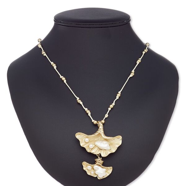 Necklace, plastic / resin / waxed cotton cord / gold-coated plastic / gold-finished steel / "pewter" (zinc-based alloy), cream and white, 67x57mm ginkgo leaf, adjustable up to 32 inches. Sold individually. image number 0