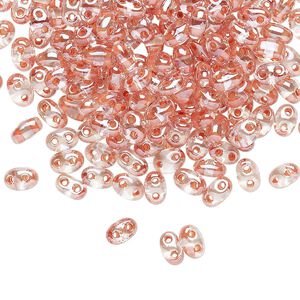 Seed bead, Preciosa Twin™ Czech glass, pkg/250g, 5x2.5mm oval, transparent peach terra color-lined clear, (38689).