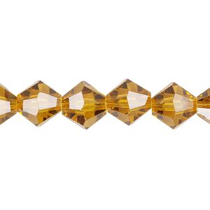 Bead 1pk transparent gold, Celestial Crystal® 10mm bicone 8 inch