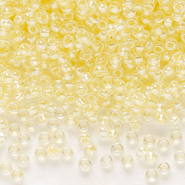 Seed bead, Preciosa Ornela Czech glass, pkg/500g, #11 rocaille, translucent color-lined luster pastel yellow, (382PY). image number 0