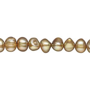 Pearl, cultured freshwater (dyed), golden copper, 6-7mm flat-sided potato, D grade, Mohs hardness 2-1/2 to 4. Sold per 15-inch strand.