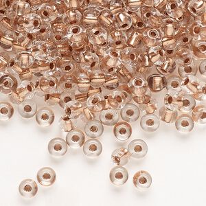 Seed bead, Preciosa Ornela Czech glass, pkg/50g, #6 rocaille, transparent copper-lined clear, (68105).