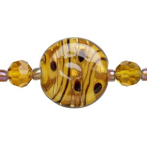 Bead, glass and lampworked glass, topaz yellow and black, 7mm faceted round / 9mm round / 21mm flat round with copper-colored glitter. Sold per 7-inch strand, approximately 25 beads.