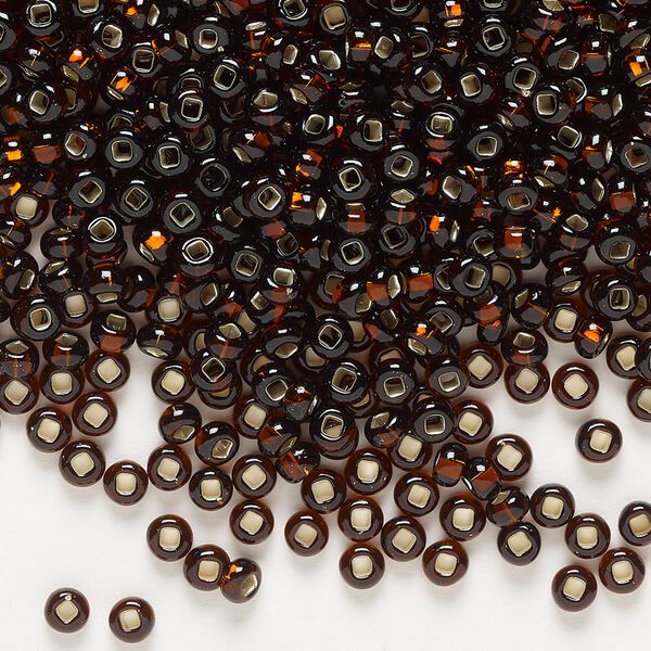 Seed bead, Preciosa Ornela Czech glass, pkg/500g, #8 rocaille, transparent silver-lined root beer, (17140). image number 0