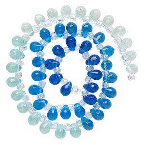 Bead, glass, transparent pale blue, blue and royal blue, 8x6mm top-drilled teardrop with irregular rondelles. Sold per 14-inch strand.