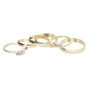 Ring mix, glass rhinestone and gold-finished brass, clear, 3mm / 4mm / 7-8mm wide, size 5 to 12-1/2. Sold per pkg of 6.