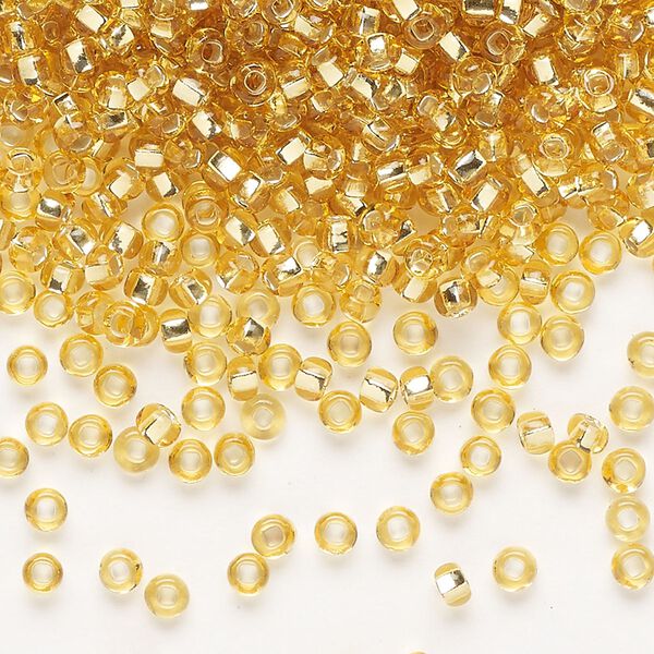 Seed bead, Preciosa Ornela Czech glass, pkg/500g, #8 rocaille, transparent silver-lined light topaz, (17020). image number 0