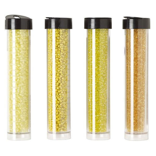 Seed bead assortment, Ming Tree™, glass, pkg/(4) 4 x 3/4 inch vials, #11 round, opaque and transparent color-lined rainbow amber yellow, yellow and cream yellow. image number 0