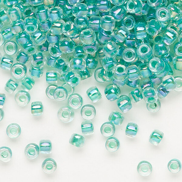 Seed bead, Dyna-Mites™, glass, transparent rainbow inside color sea foam, #6 round. Sold per 40-gram pkg. image number 0
