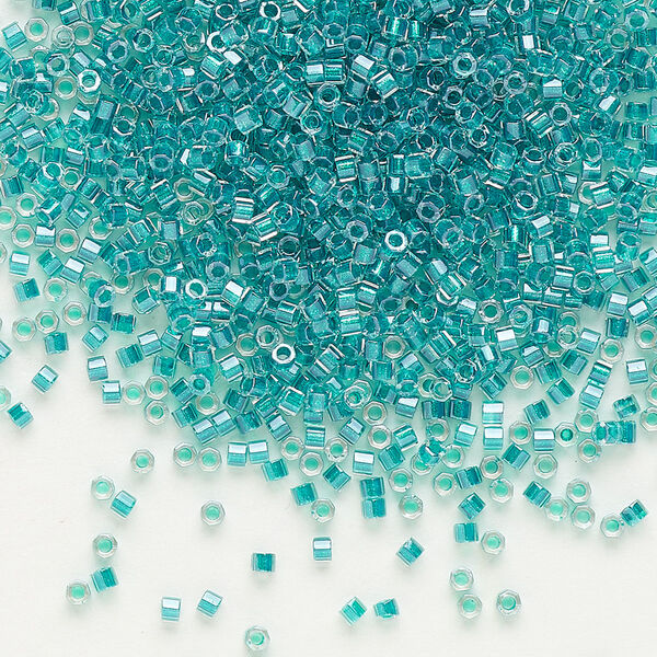Seed bead, Delica®, glass, pkg/7.5g, #11 cut, translucent dark aqua-lined luster crystal clear (DBC-0918). image number 0