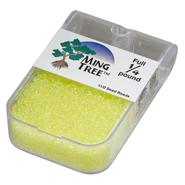 Seed bead, Ming Tree™, glass, pkg/1/4 pound, #11 round, transparent color-lined neon yellow. image number 0