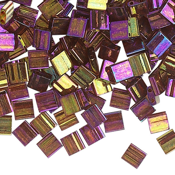 Seed bead, TILA®, glass, pkg/250g, 5mm full tila square, translucent rainbow gold luster dark topaz, (TL-301). image number 0