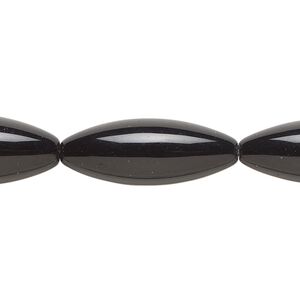 Bead, glass, opaque black, 26x10mm oval. Sold per 14-inch strand, approximately 10 beads.