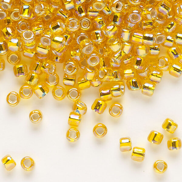Seed bead, Dyna-Mites™, glass, silver-lined translucent rainbow orange, #6 round with square hole. Sold per 40-gram pkg. image number 0