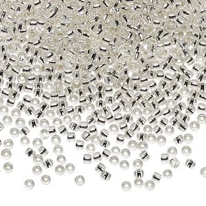 Seed bead, TOHO BEADS®, glass, pkg/7.5g, #11 round, transparent silver-lined crystal clear (TR-11-21).