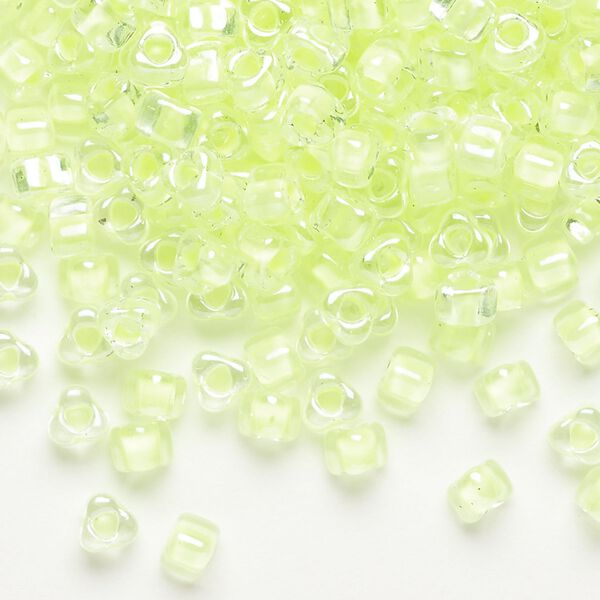 Seed bead, Miyuki, glass, transparent clear color-lined lime, (TR1119), #5 triangle. Sold per 25-gram pkg. image number 0