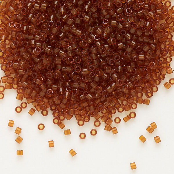 Seed bead, Delica®, glass, pkg/7.5g, #11 round, transparent dark topaz (DB-0709). image number 0