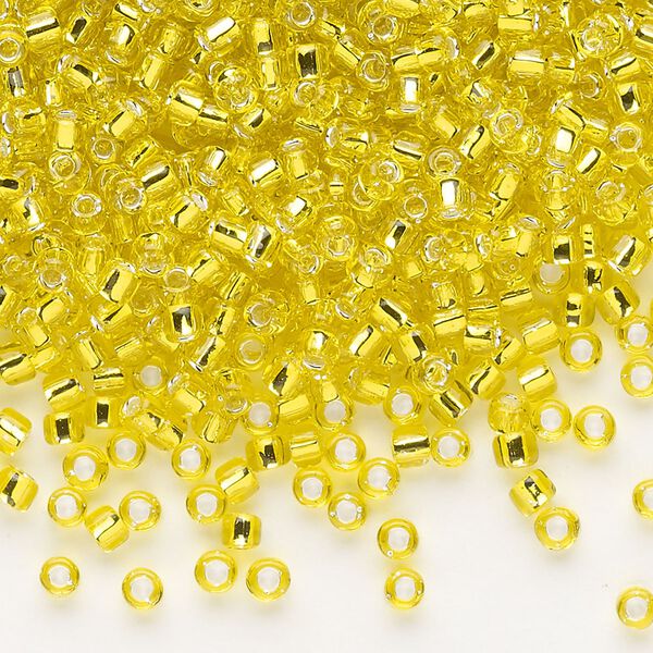 Seed bead, Dyna-Mites™, glass, silver-lined translucent yellow, #8 round. Sold per 1/2 kilogram pkg. image number 0
