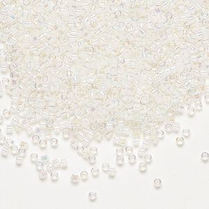 Seed bead, Delica®, glass, pkg/7.5g, #11 round, translucent pale peach-lined rainbow crystal clear (DB-0052).
