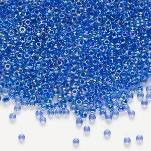Seed bead, Miyuki, glass, pkg/25g, #11 rocaille, translucent cobalt-lined rainbow sapphire (RR-353).