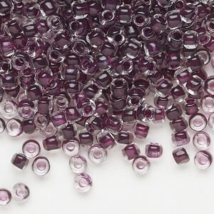 Seed bead, Dyna-Mites™, glass, translucent inside color dark mauve, #6 round. Sold per 1/2 kilogram pkg.