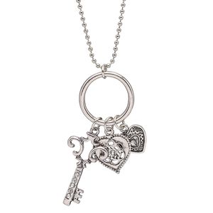 Necklace, glass rhinestone with antique imitation rhodium-plated brass and pewter (tin-based alloy), clear, 37x16mm single-sided key with ring and heart charms, 36-inch continuous loop. Sold individually.