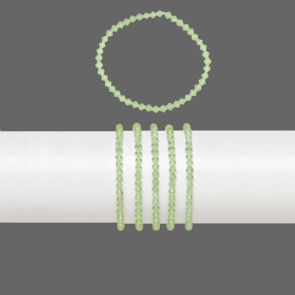 Bracelets, stretch, glass, transparent lime green, 4mm faceted bicone, 7 inches. Sold per pkg of 5. image number 0