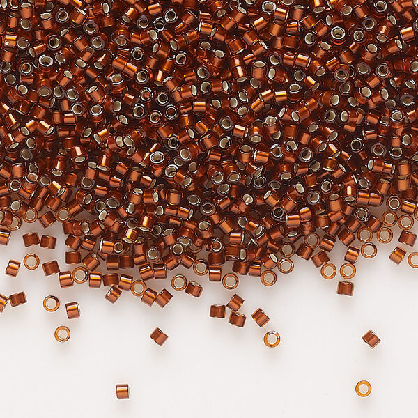 Seed bead, Delica®, glass, pkg/7.5g, #11 round, translucent silver-lined glazed dark topaz (DB-1683). image number 0