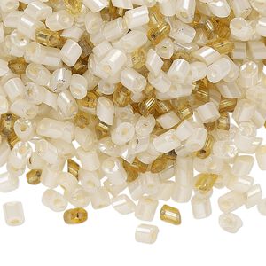 Bead mix, vintage Czech glass, translucent and transparent ecru and gold luster, 2mm-4x3mm parallelogram with 0.6mm hole. Sold per 1.5-ounce pkg, approximately 1,200 to 1,300 beads.
