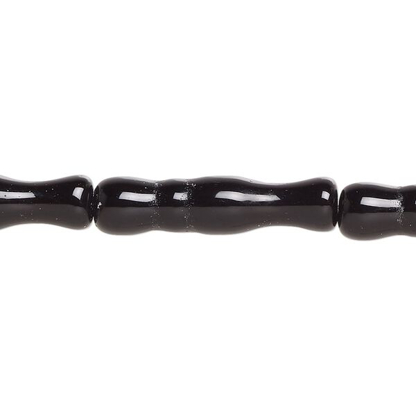 Bead, glass, opaque black, 25x6mm-26x7mm textured round tube. Sold per 15-inch strand. image number 0