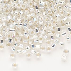 Seed bead, Dyna-Mites™, glass, silver-lined translucent rainbow clear, #6 round with square hole. Sold per 40-gram pkg.