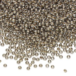 Seed bead, TOHO BEADS®, glass, pkg/7.5g, #11 round, transparent gold-lined black diamond (TR-11-993).