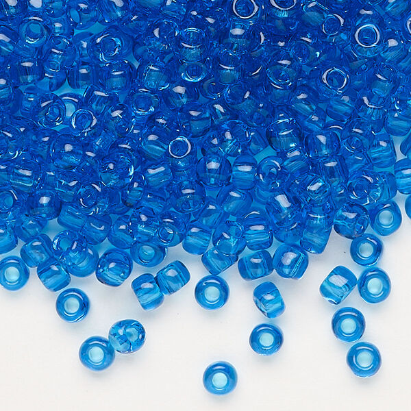 Seed bead, Dyna-Mites™, glass, transparent turquoise blue, #6 round. Sold per 1/2 kilogram pkg. image number 0