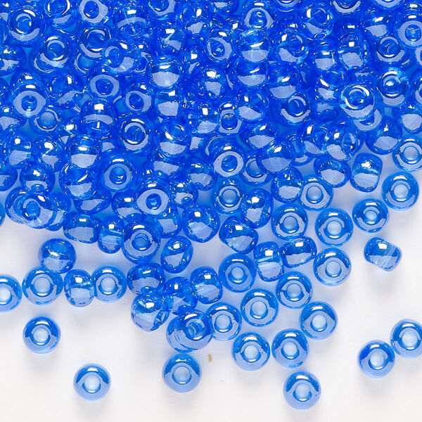 Seed bead, Preciosa Ornela Czech glass, pkg/500g, #6 rocaille, translucent luster light blue, (36050). image number 0