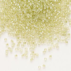 Seed bead, Delica®, glass, pkg/7.5g, #11 round, translucent peridot green-lined luster crystal clear (DB-0903).