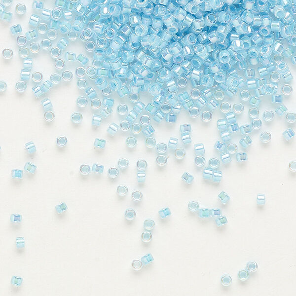 Seed bead, Delica®, glass, pkg/7.5g, #11 round, translucent aqua-lined rainbow crystal clear (DB-0057). image number 0