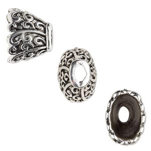 Cone, antique silver-finished "pewter" (zinc-based alloy), 16x12x12mm scalloped flat oval with scroll design, 12x8mm inside diameter. Sold per pkg of 6.