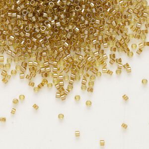 Seed bead, Delica®, glass, pkg/50g, #11 round, translucent honey beige-lined luster chartreuse (DB-0909).