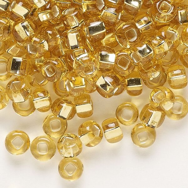 Seed bead, Preciosa Ornela, glass, transparent silver-lined light topaz, #2 rocaille with square hole. Sold per 50-gram pkg. image number 0