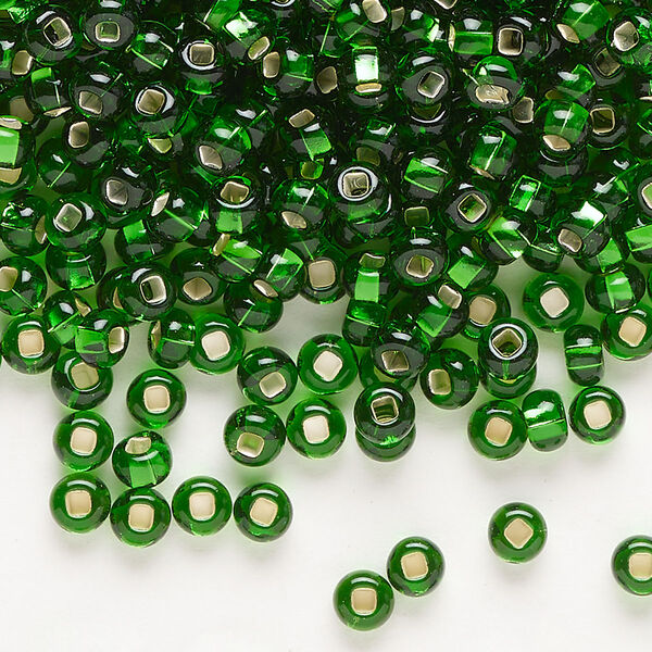 Seed bead, Preciosa Ornela Czech glass, pkg/500g, #6 rocaille, transparent silver-lined green, (57120). image number 0