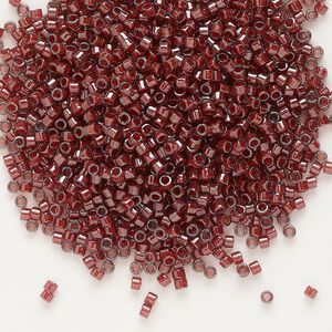 Seed bead, Delica®, glass, pkg/7.5g, #11 round, translucent cranberry-lined luster crystal clear (DB-0280).